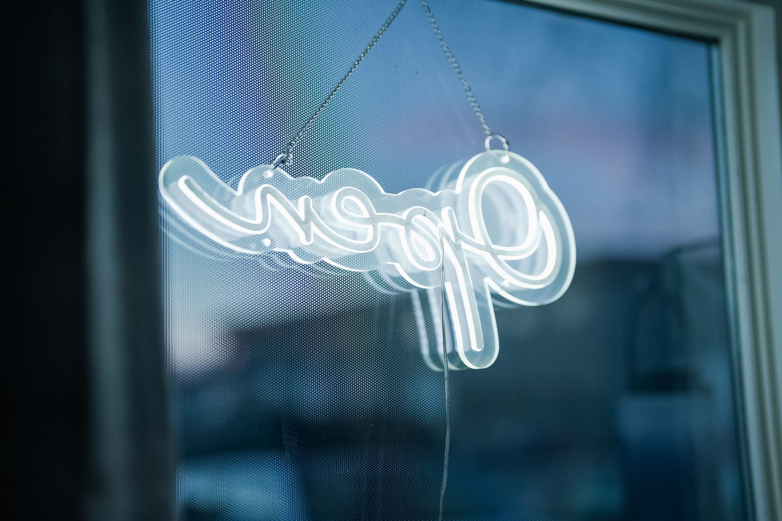 Open sign at the Ermine storefront in midtown Anchorage
